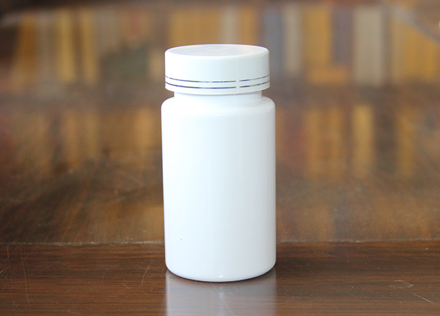 100-2cc瓷白瓶白色塑料蓋 高度：90mm  直徑：45mm